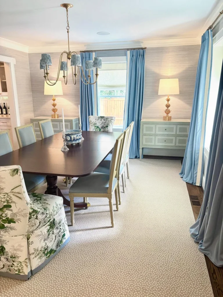 1. Blue Curtains and Textured Wallpaper Dining Room