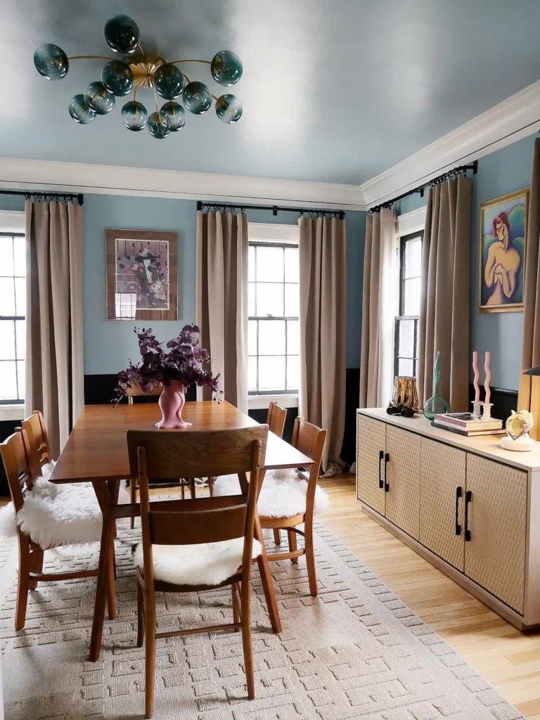 1. Dusty Blue Walls with Mid Century Charm 1