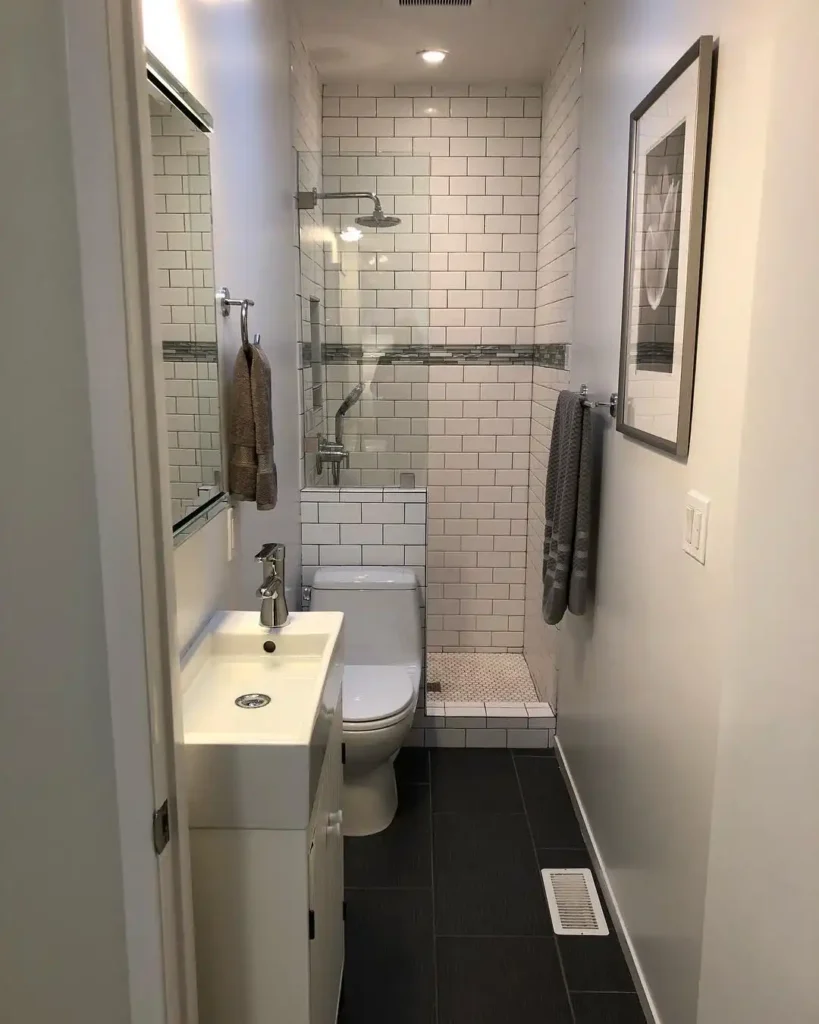 1. Narrow White Subway Tile Bathroom