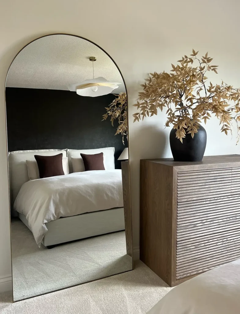 10. Arched Mirror with Fluted Wood Dresser