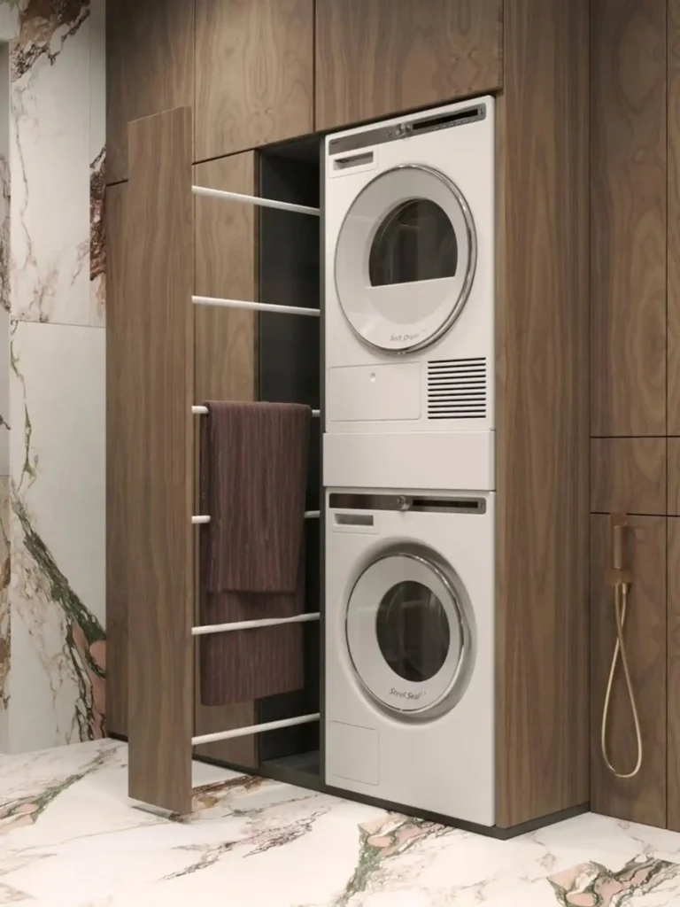 10. Pull Out Towel Rack Beside Built In Stacked Machines