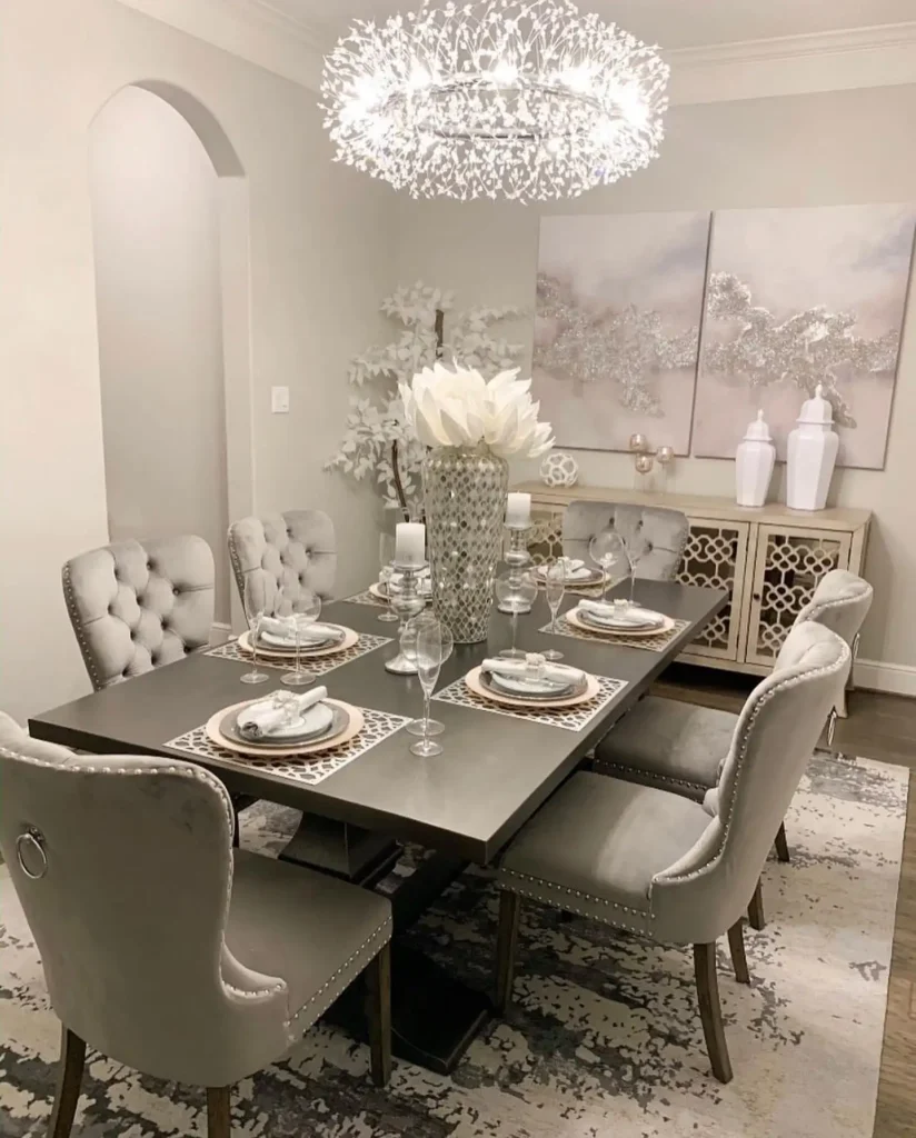 10. Tufted Chairs With Sparkler Chandelier