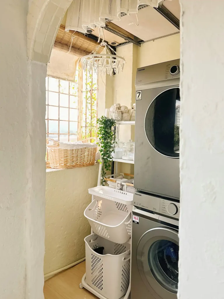 11. Arched Doorway Leading to Compact Laundry Corner