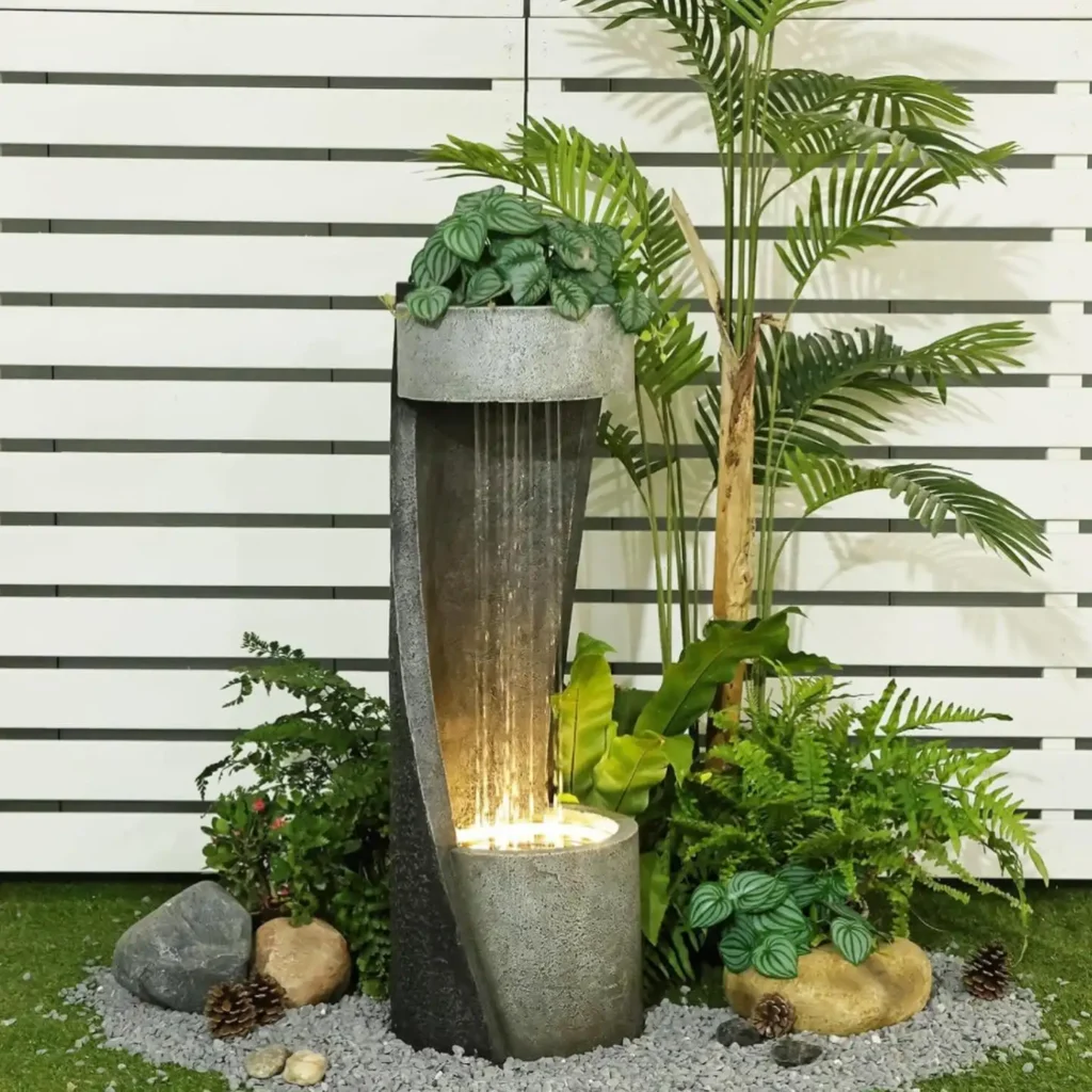 11. Twisted Concrete Planter Fountain