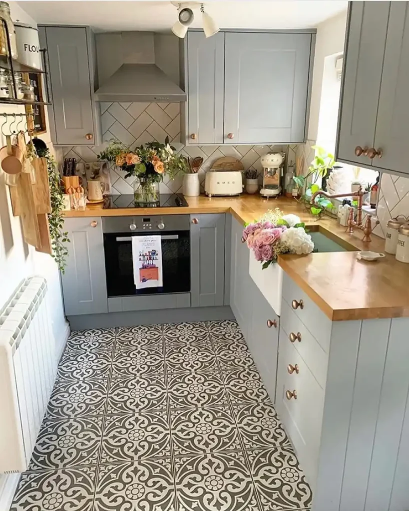 13. Patterned Tile Floor With Copper Hardware