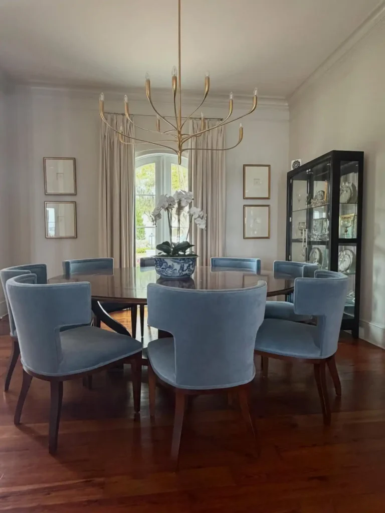 2. Powder Blue Velvet Chairs Around a Round Table