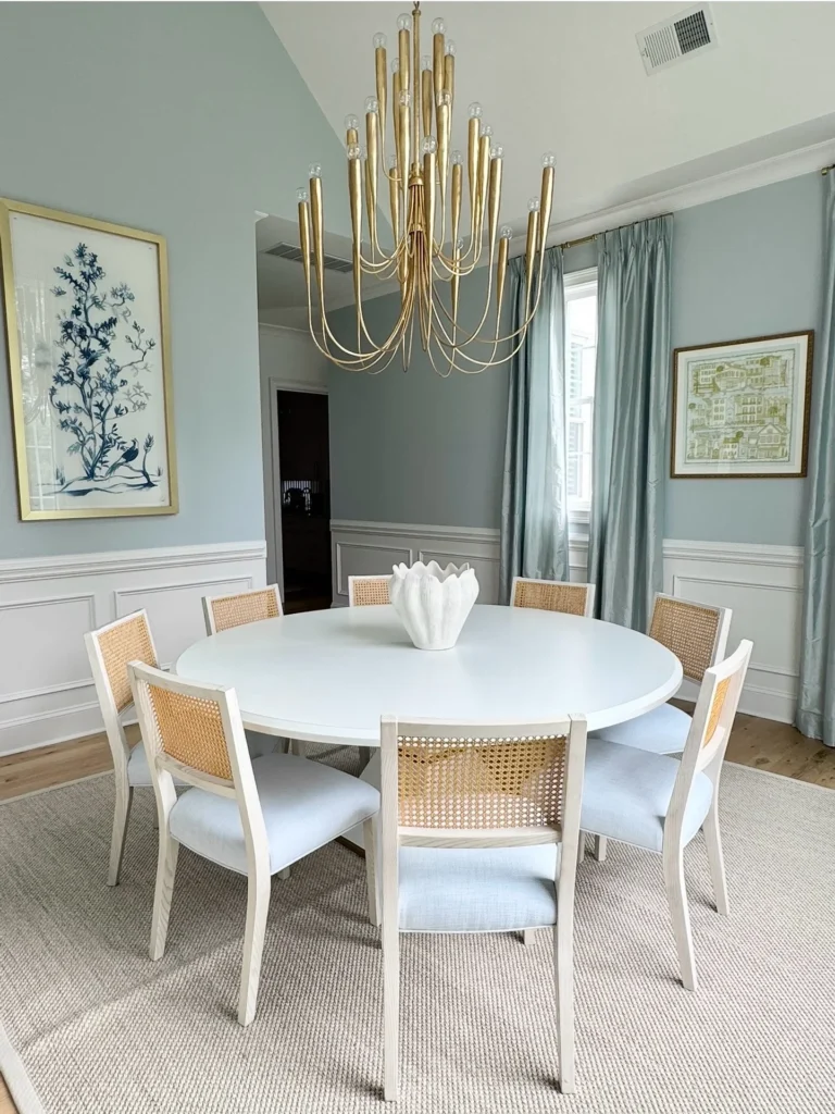 2. Round White Table with Cane Back Chairs
