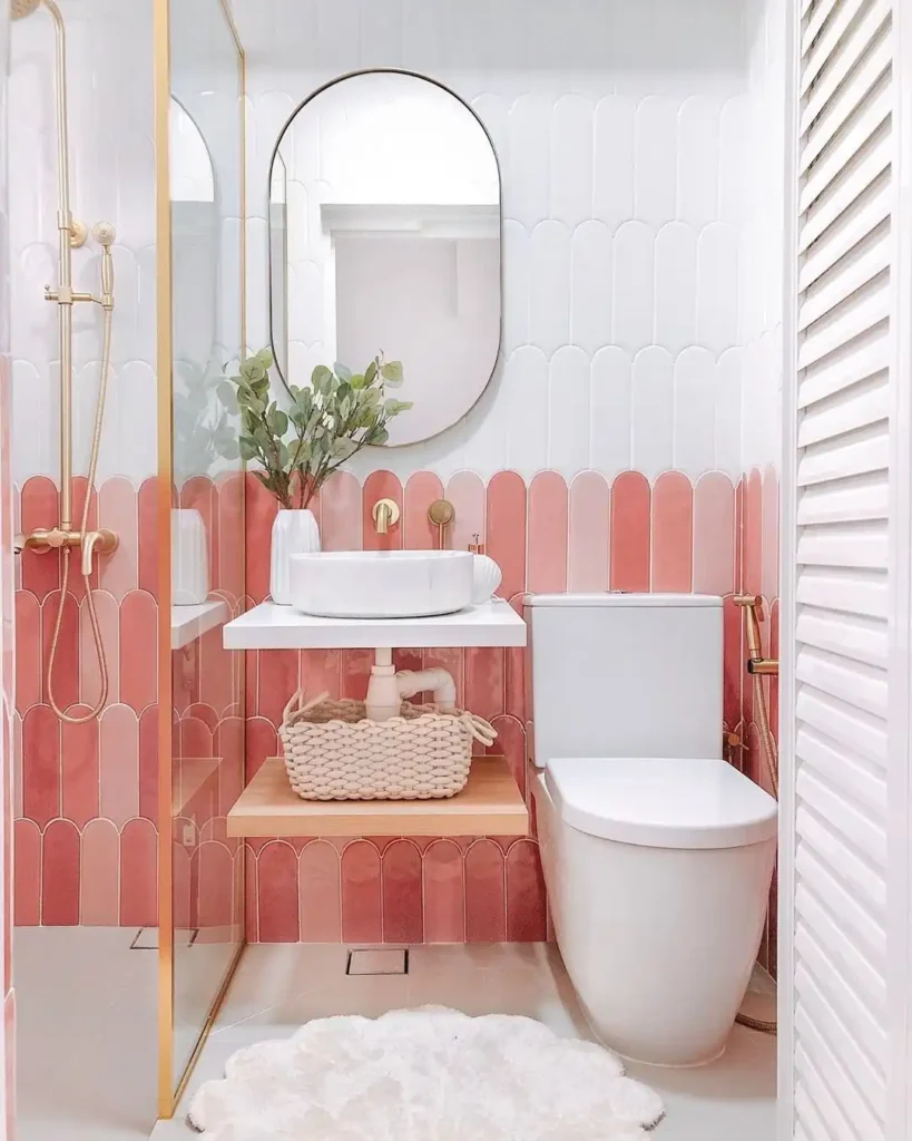 2. Scalloped Pink Tile Bathroom
