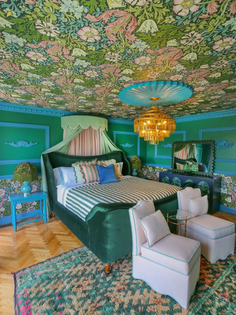 3. Floral Ceiling and Green Velvet Bed