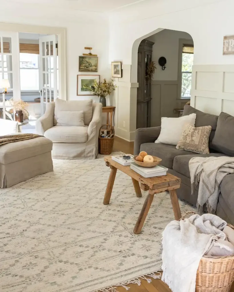 3. Neutral Living Room with a Vintage Wooden Bench