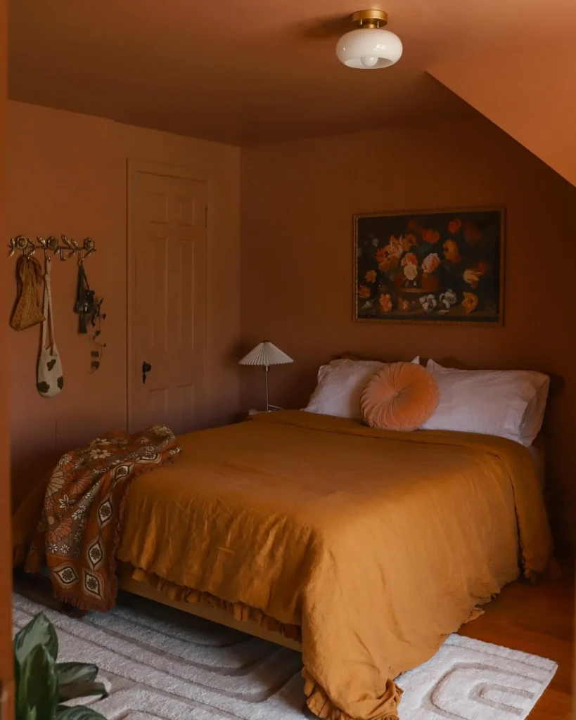 3. Terracotta Bedroom with a Mustard Linen Duvet