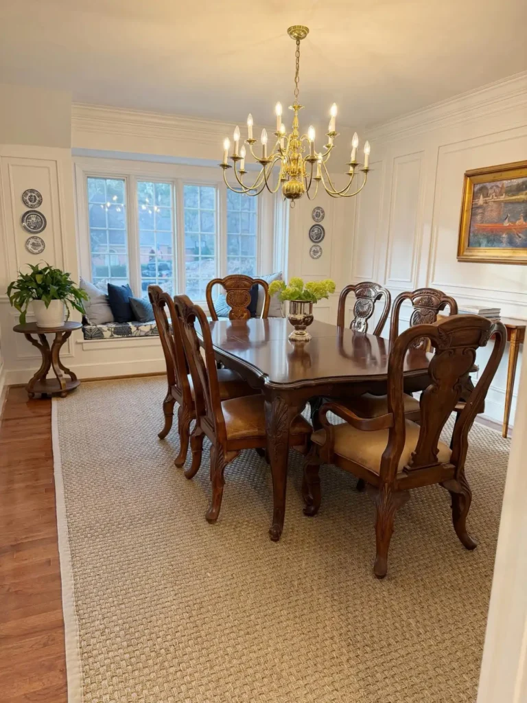 4. Carved Wood Table With Brass Chandelier