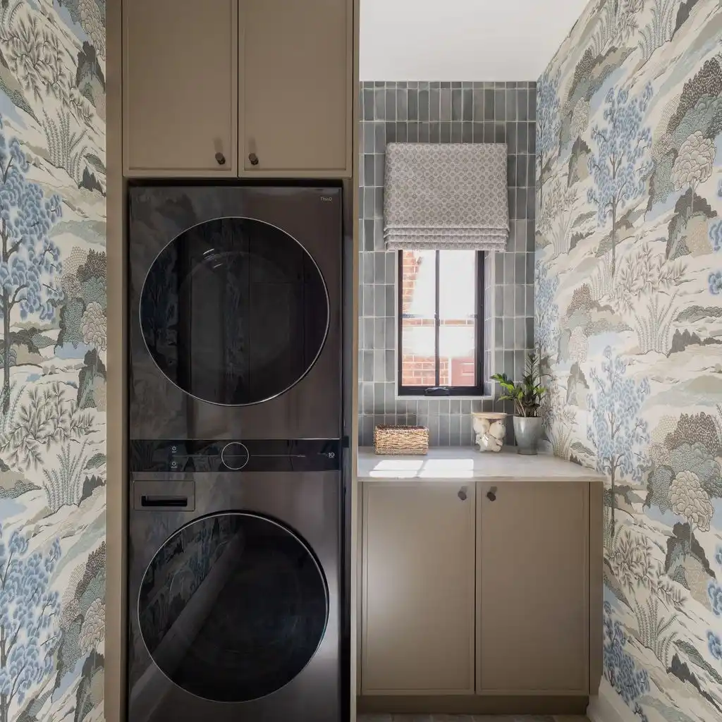 4. Stacked Black Machines Framed by Scenic Wallpaper