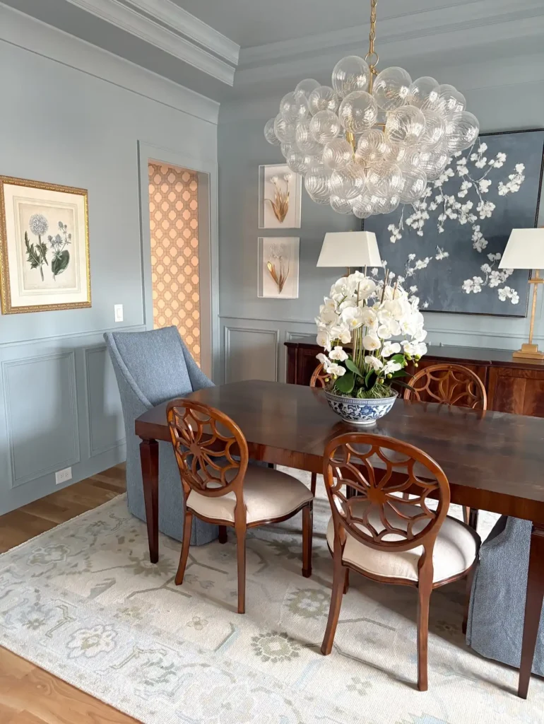5. Bubble Chandelier Over Carved Wood Chairs