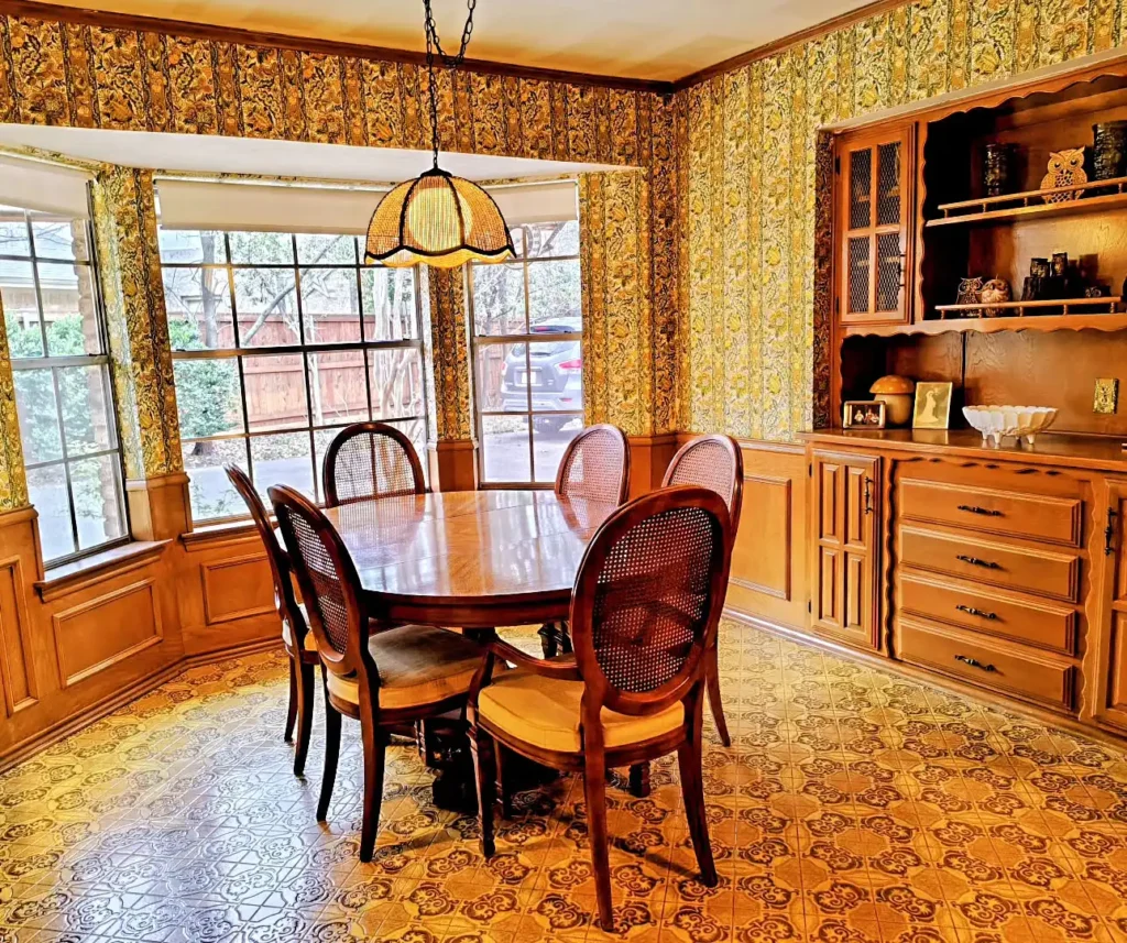 6. Cane Back Dining Chairs with a Wicker Pendant Light
