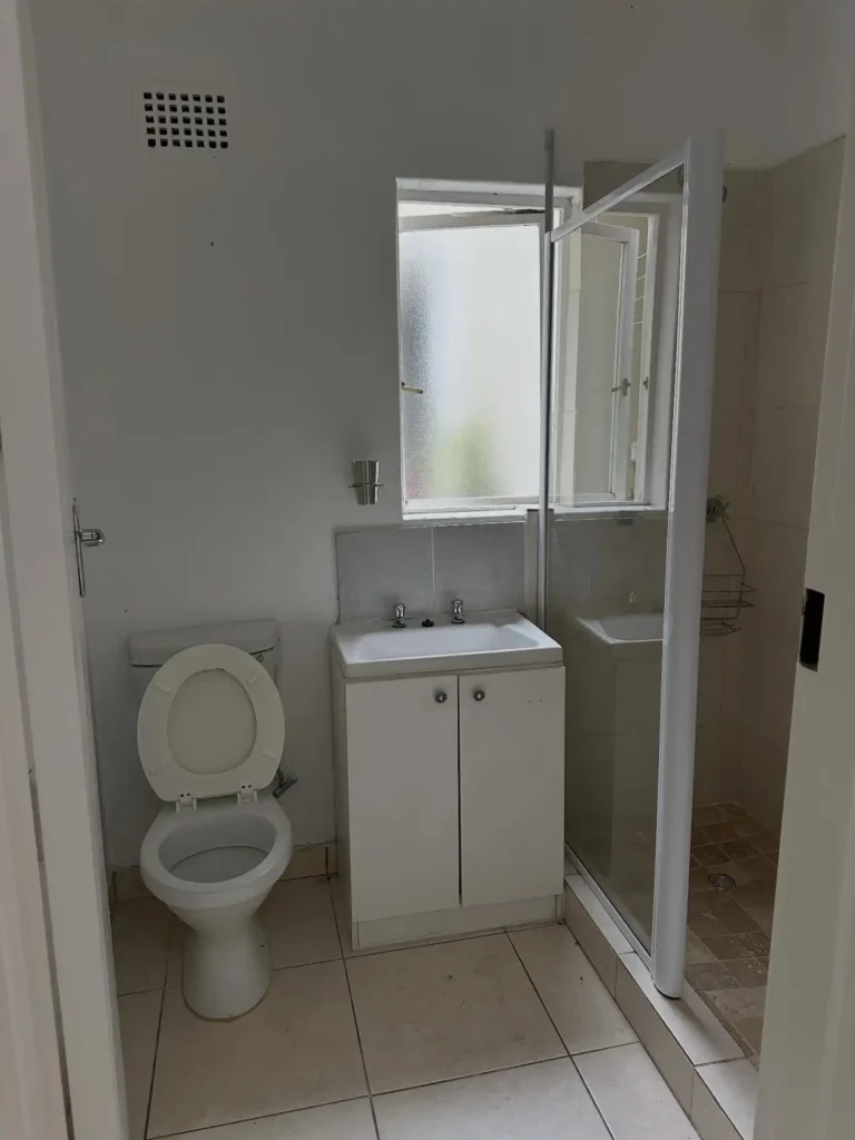 6. Corner Window Vanity Bathroom