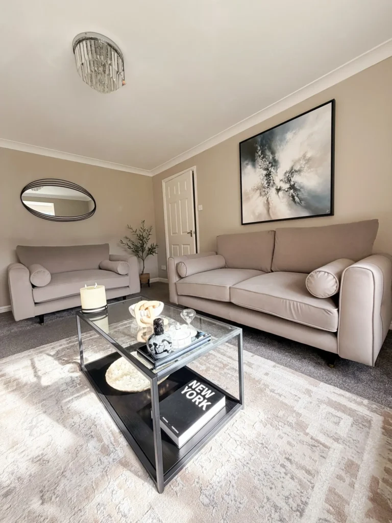 7. Beige Living Room with Abstract Wall Art
