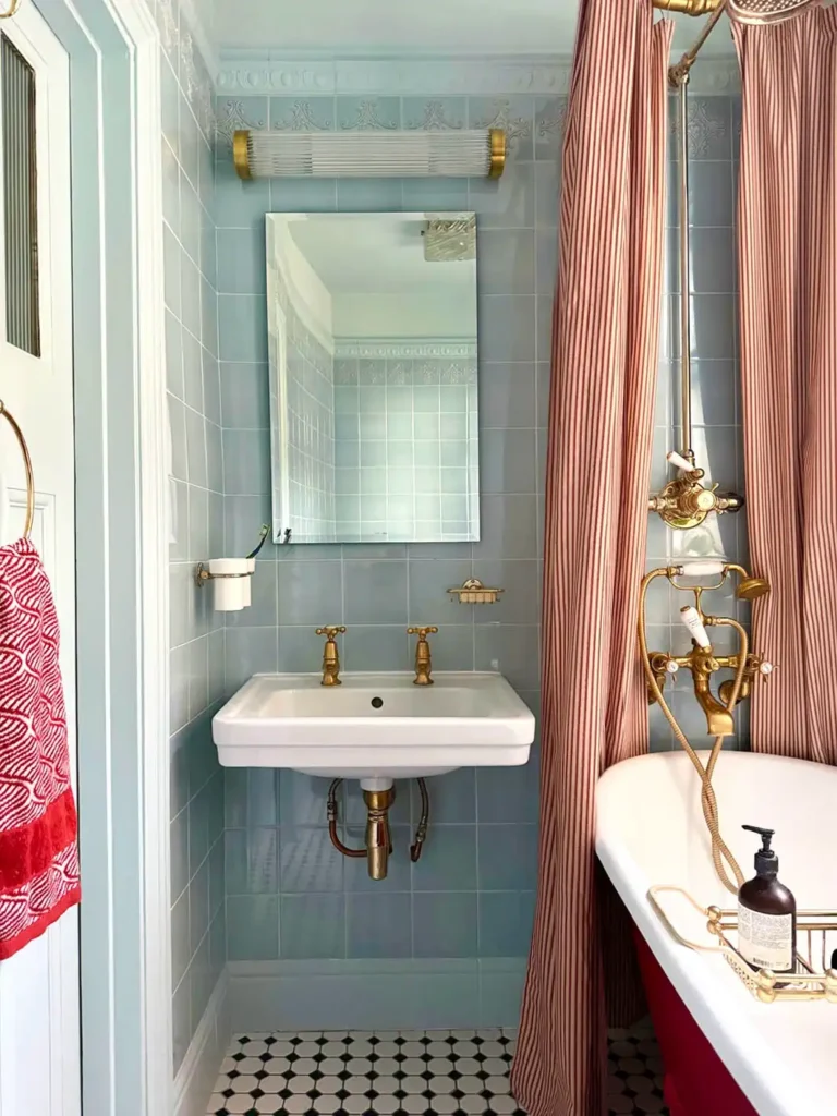 7. Vintage Blue Tile Bathtub Bathroom