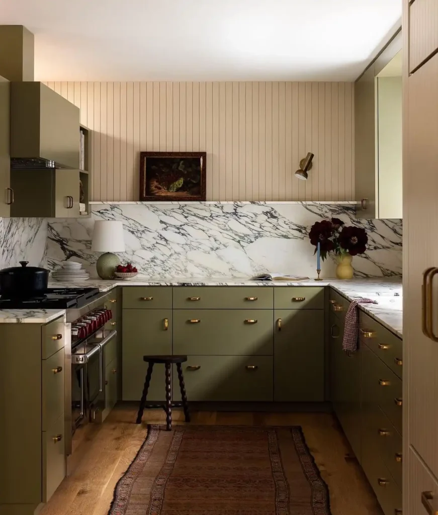 8. Olive Green Cabinets With Marble Backsplash