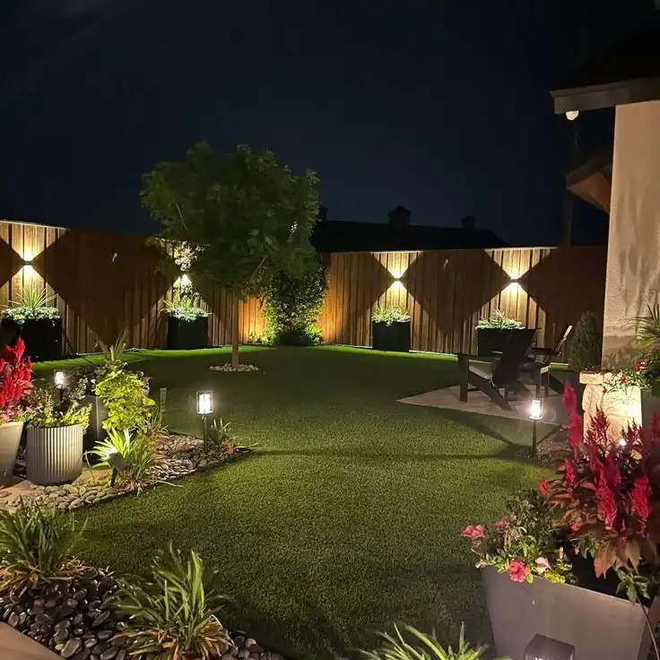9. Fence Mounted Sconces Casting Diamond Shadows