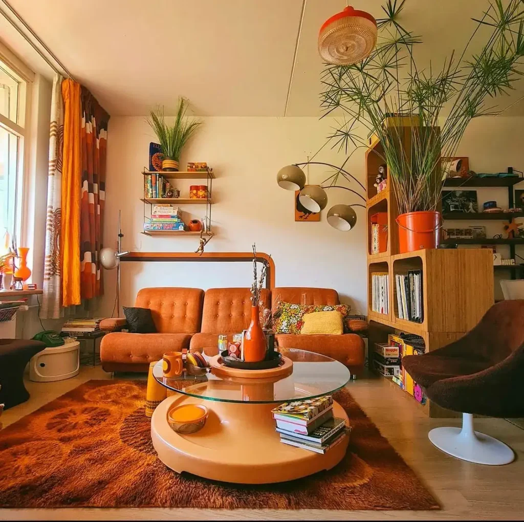 9. Rust Sofa with Round Glass Table