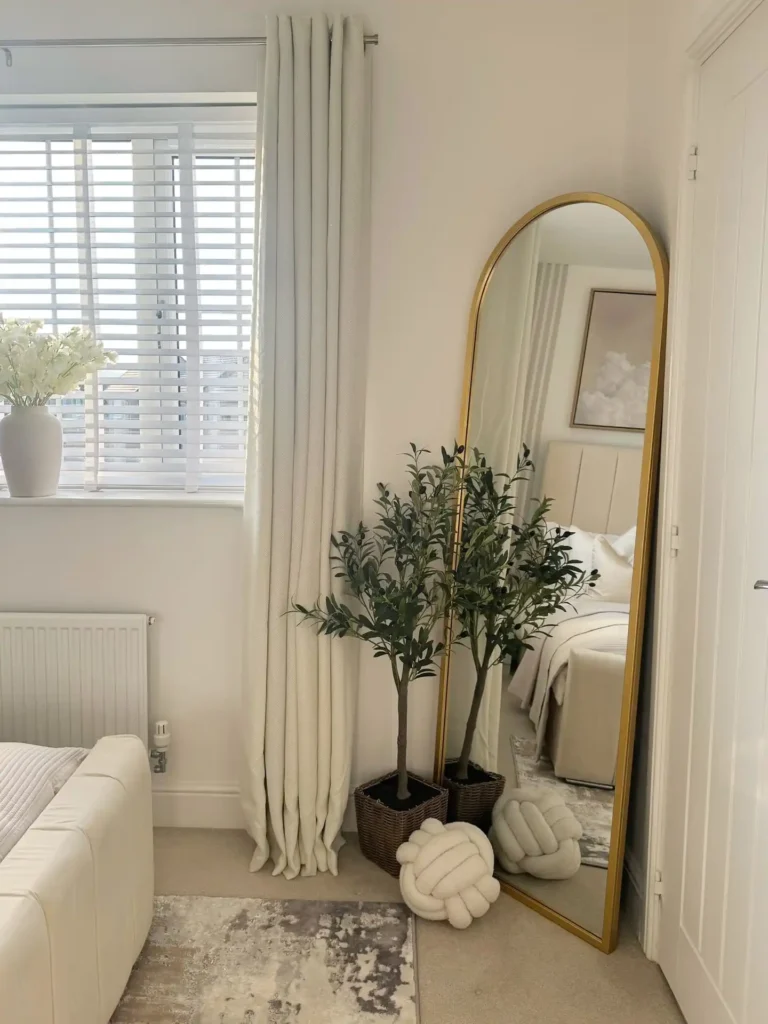 1. Arched Mirror with Faux Olive Trees