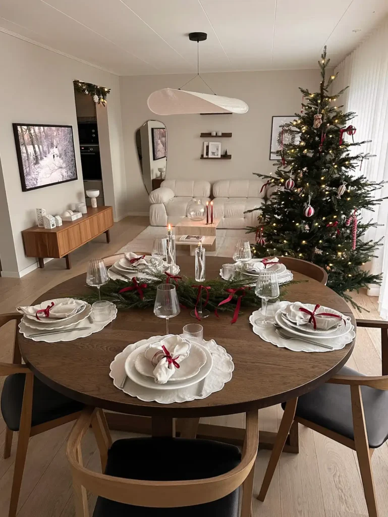 1. Fresh Garland Table Runner with Red Ribbon Accents