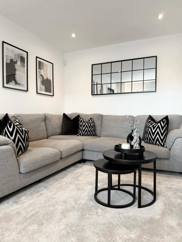 10. Nesting Black Tables With Chevron Pillows