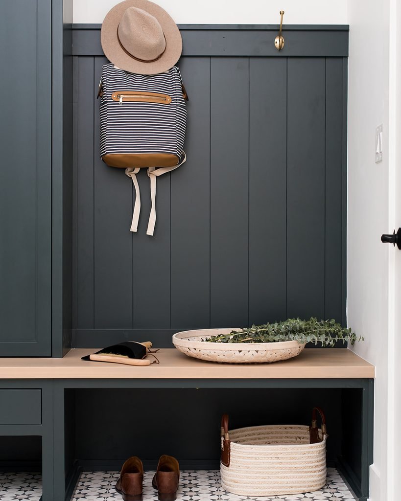 10. Wood Bench with Wall Hooks and Woven Baskets