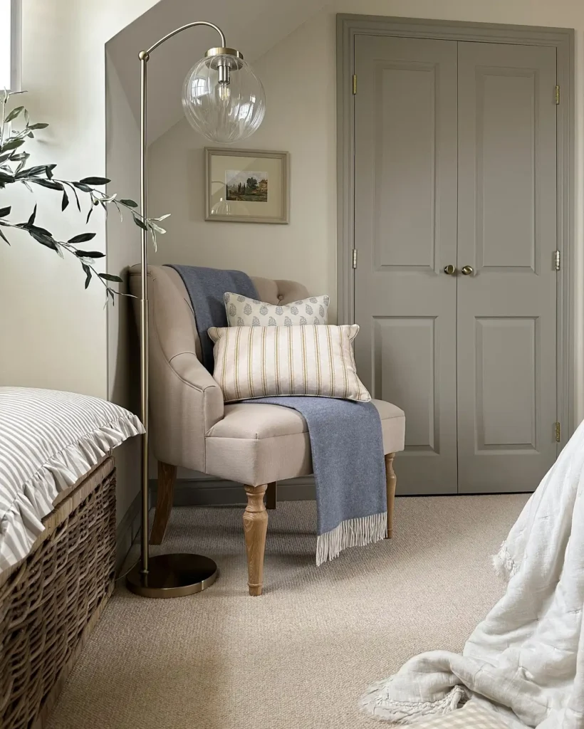 11. Beige Tufted Chair with Globe Floor Lamp