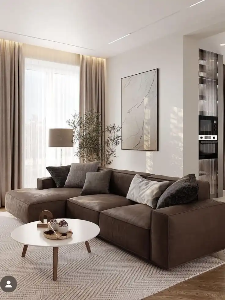 12. Modern Brown Sofa Near Kitchen Nook