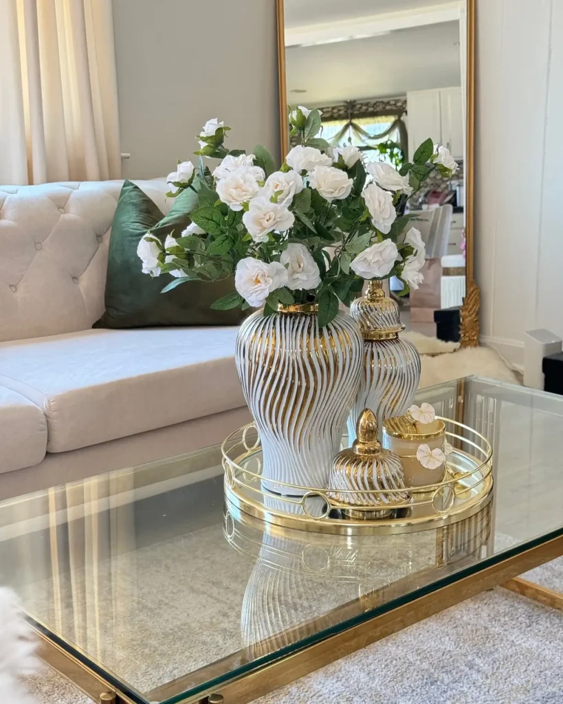 2. Glass and Gold Coffee Table