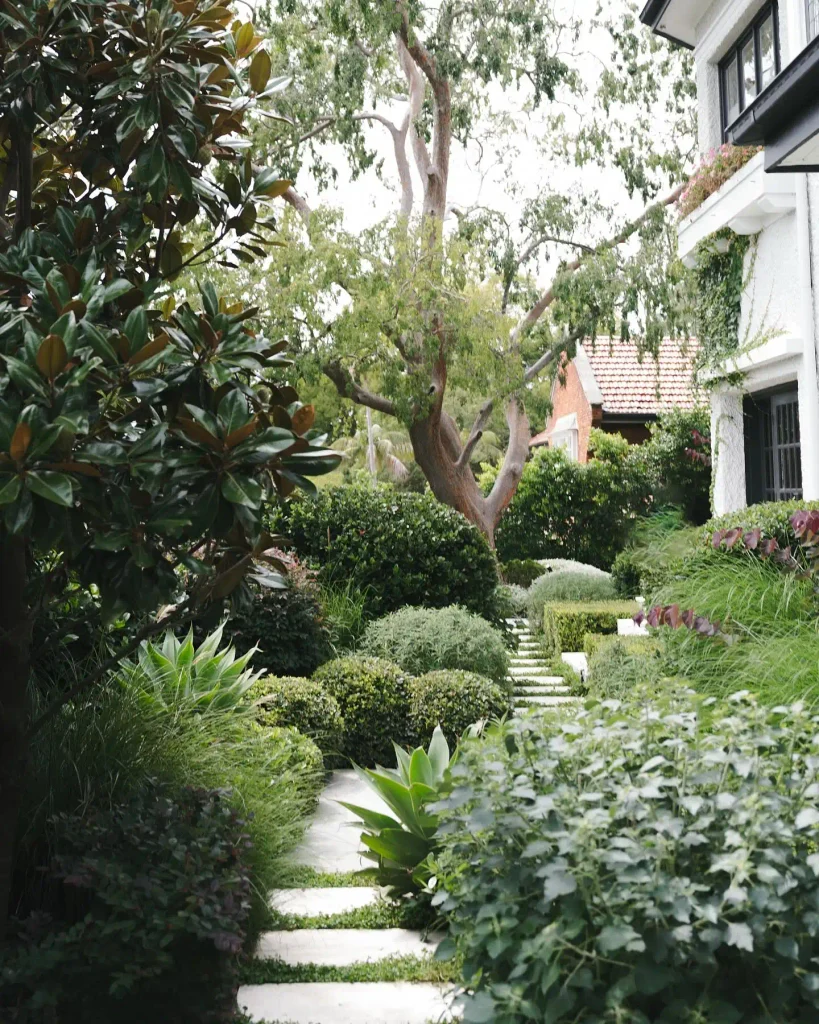 2. Lush Layered Pathway Garden