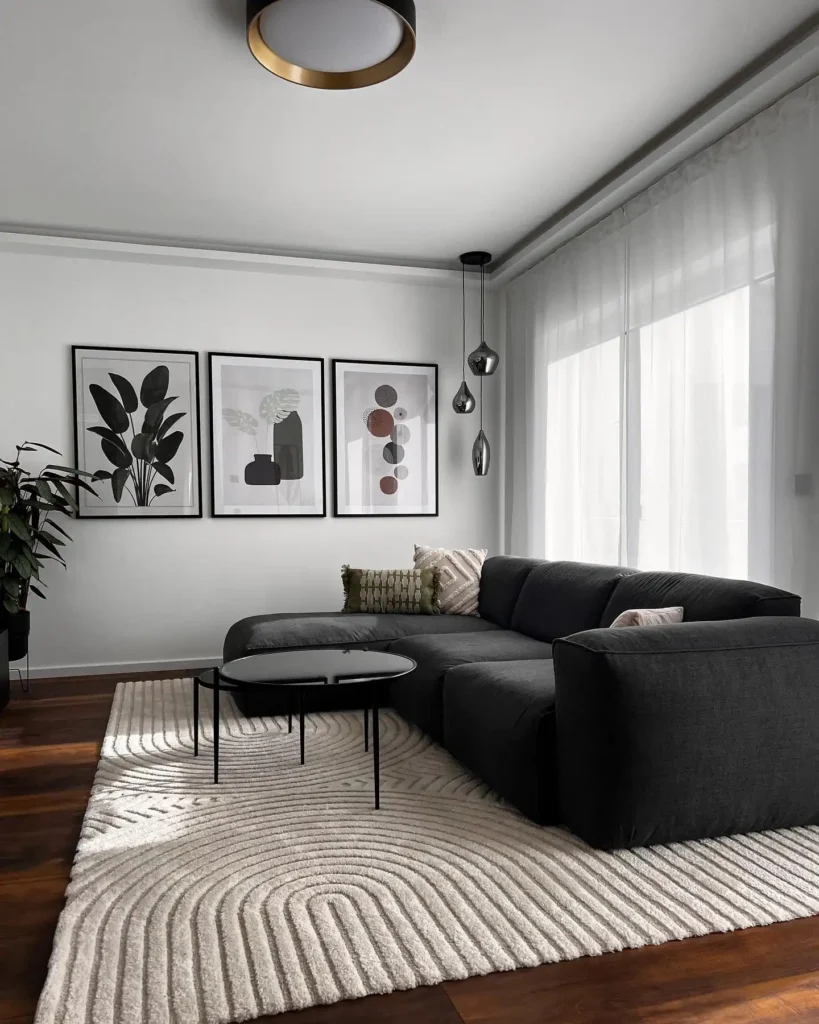 5. Charcoal Sectional With Glass Top Coffee Table