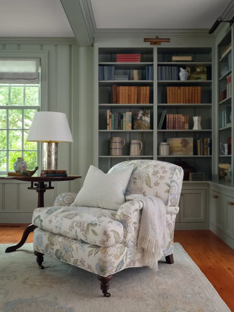 14 Cozy Living Room Reading Corners Built Around One Armchair 7 6. Floral Chintz Chair Against Sage Built Ins