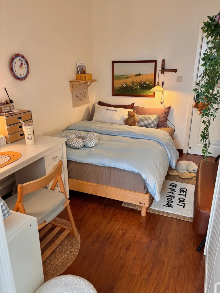 6. Playful Bedroom with Blue Bedding and Wooden Bed Frame