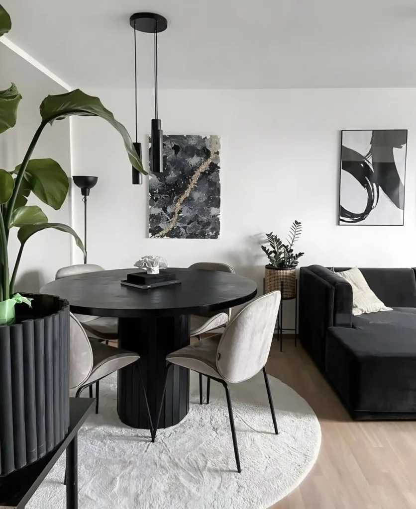 6. Round Black Dining Table With Fluted Base