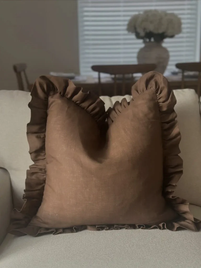 7. Ruffled Chocolate Linen Pillow