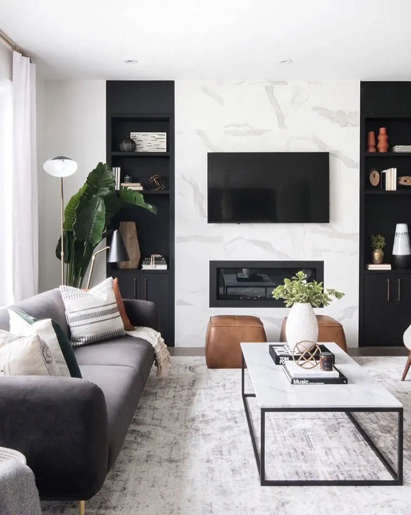 9. Black Built Ins Framing A Marble Fireplace Wall