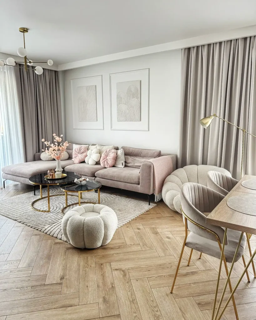 9. Blush Beige Living Room With Herringbone Floors And Scalloped Chairs