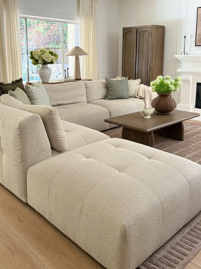 9. Boucle Sectional With Tufted Ottoman