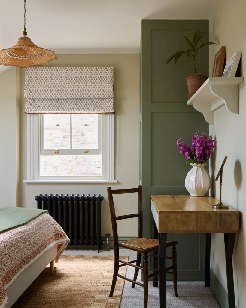 9. Wooden Desk Nook Beside Olive Cabinetry