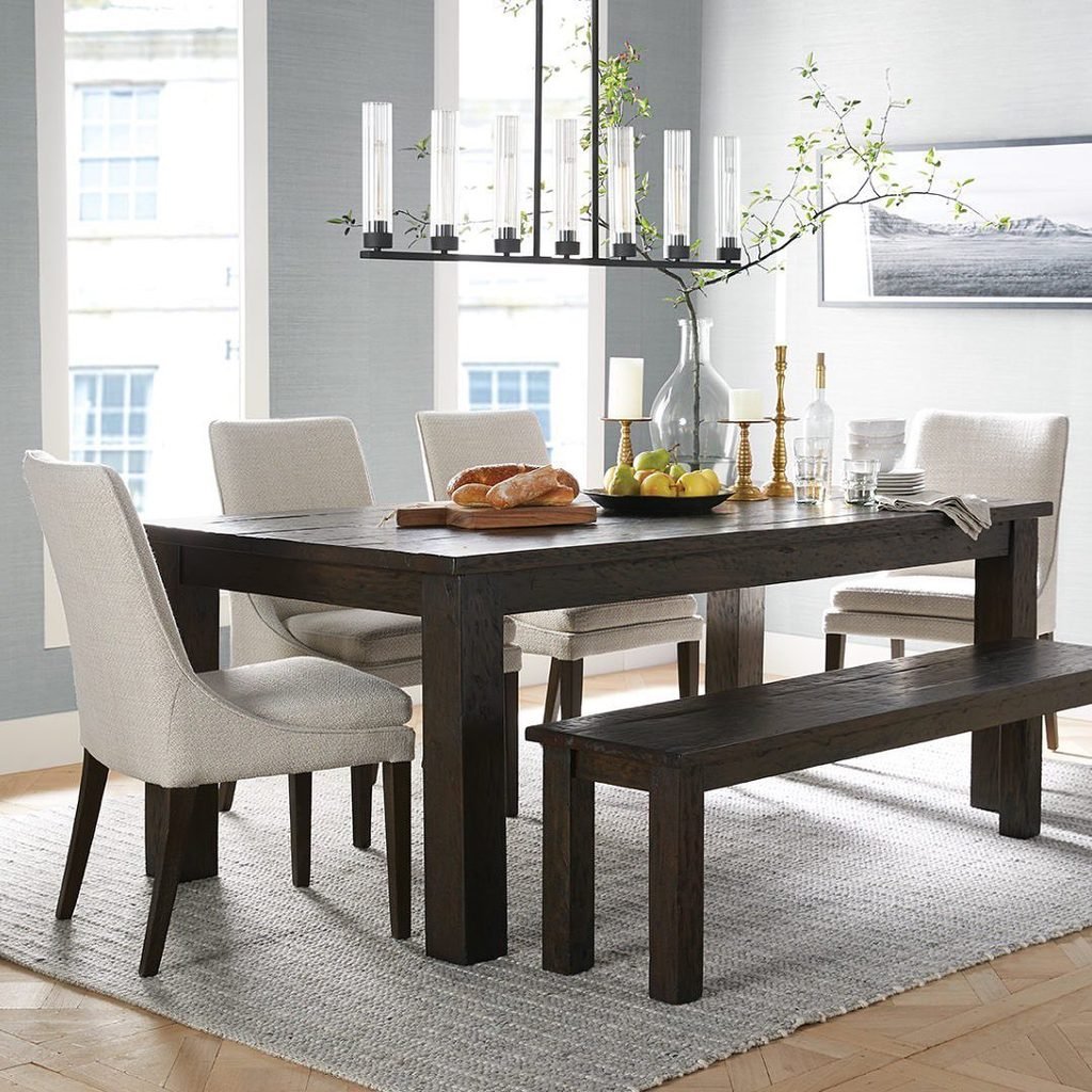 6. Dark Wood Bench Paired With Upholstered Chairs