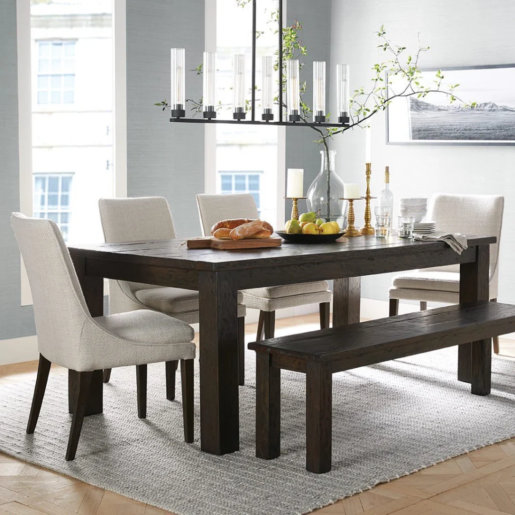6. Dark Wood Bench Paired With Upholstered Chairs